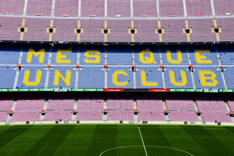 The iconic "Mes Que Un Club" slogan displayed at the Camp Nou stadium in Barcelona, Spain.