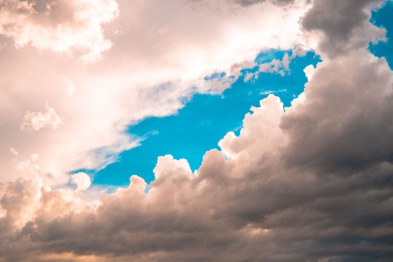 Captivating cloud formations in a bright blue sky, showcasing nature's art.
